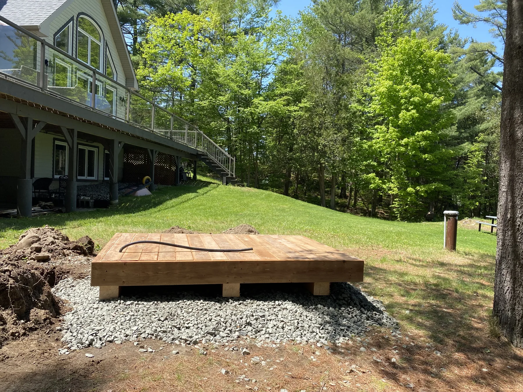 hot tub deck in back yard of cottage
